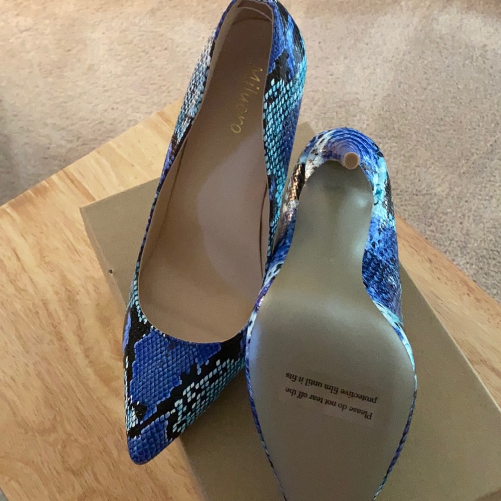 Brand new never worn blue snake skin heels